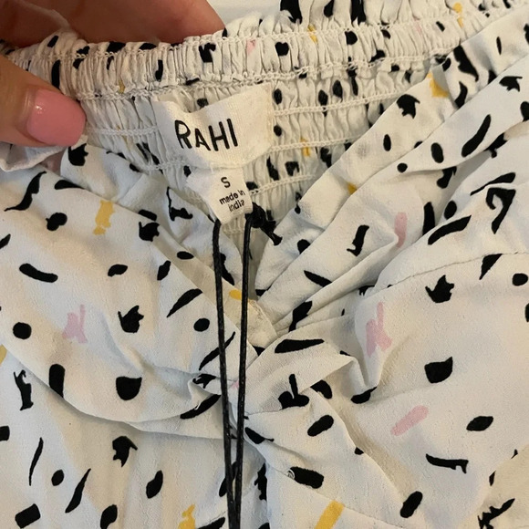 Elegant White and Black Polka Dot Mini Dress - Picture 8 of 8